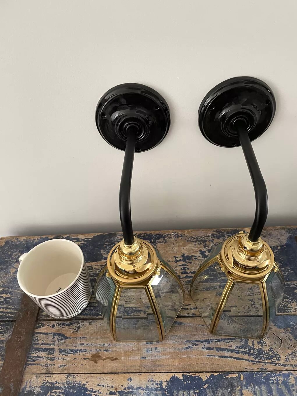 Pair of vintage glass and brass sconces electrified to nine
