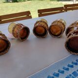 6 small glasses Amber Blown Glass garnished wicker 1 cracked