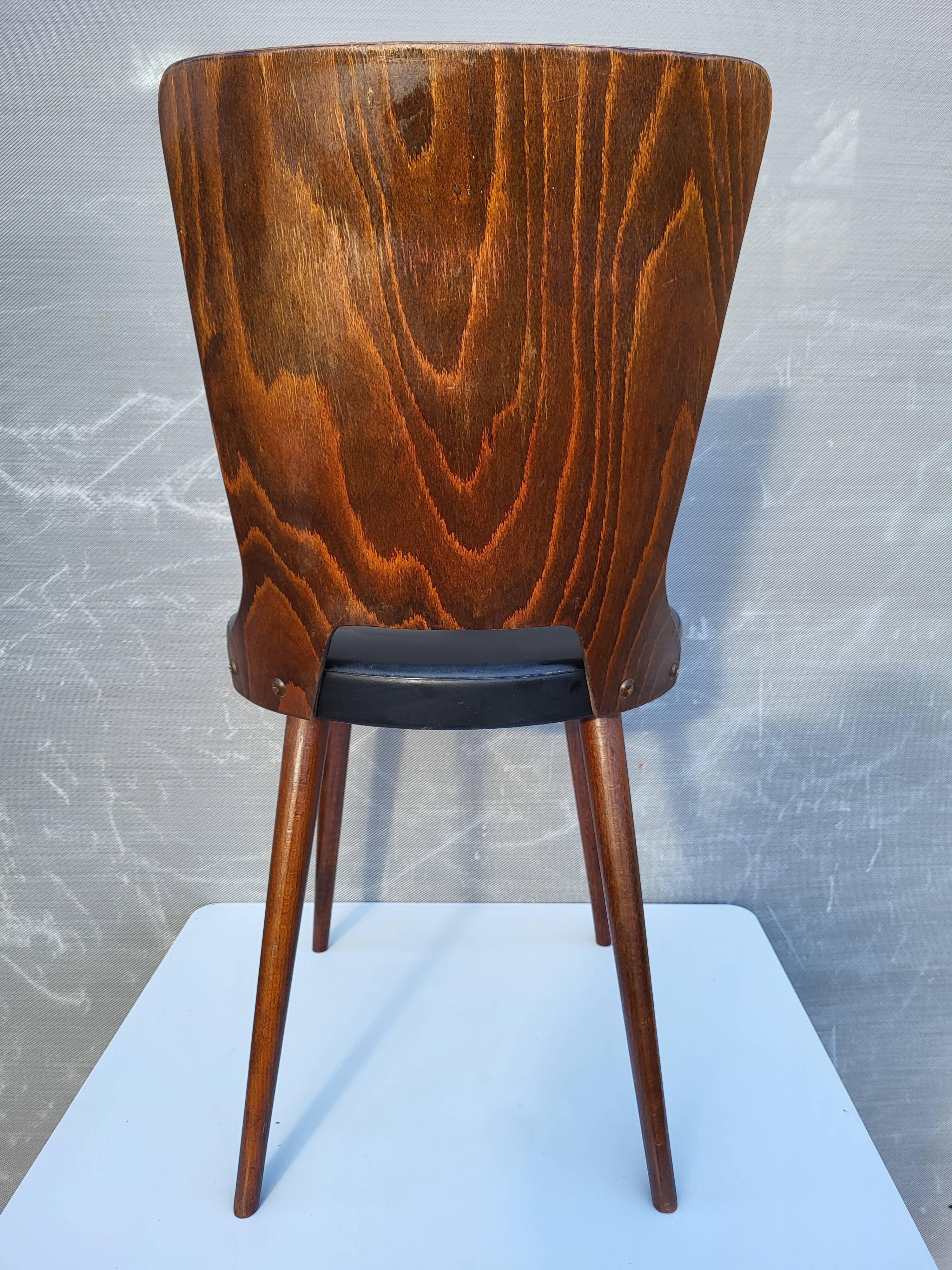 Pair of Dove chairs • Baumann • Black faux leather