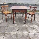 Antique farmhouse table and bistro chairs