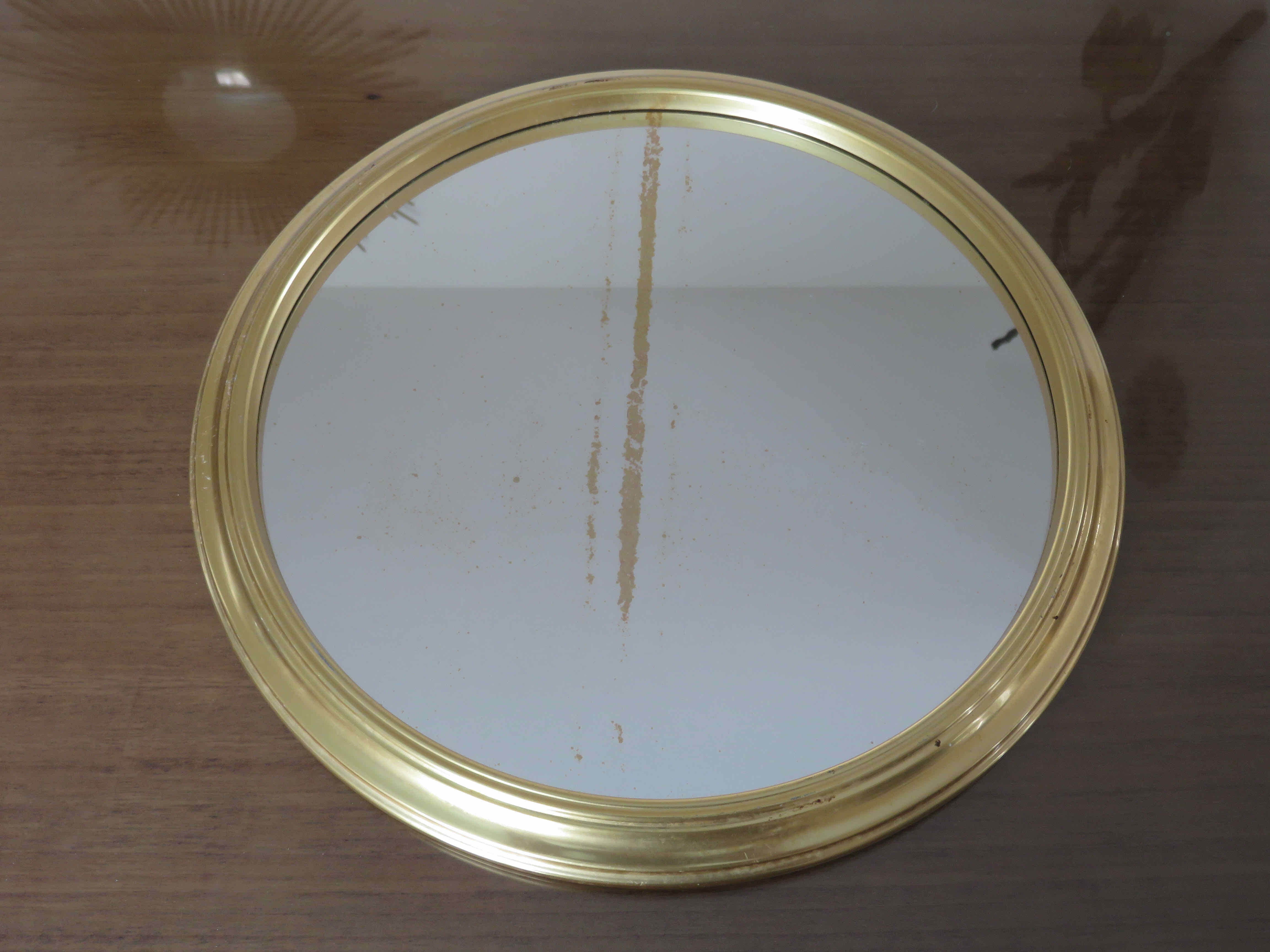 Round mirror top in gilded aluminum art deco