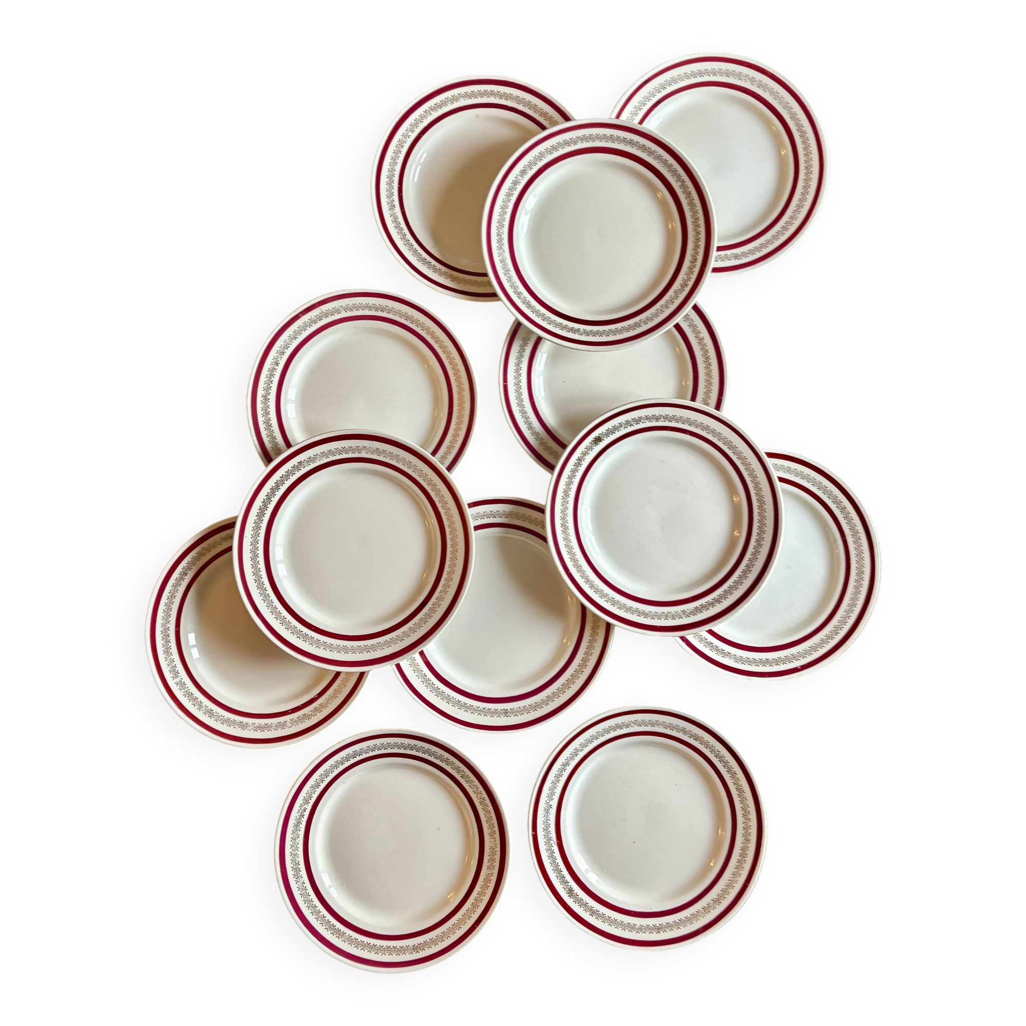Set of 12 antique Gien red and gold dinner plates.