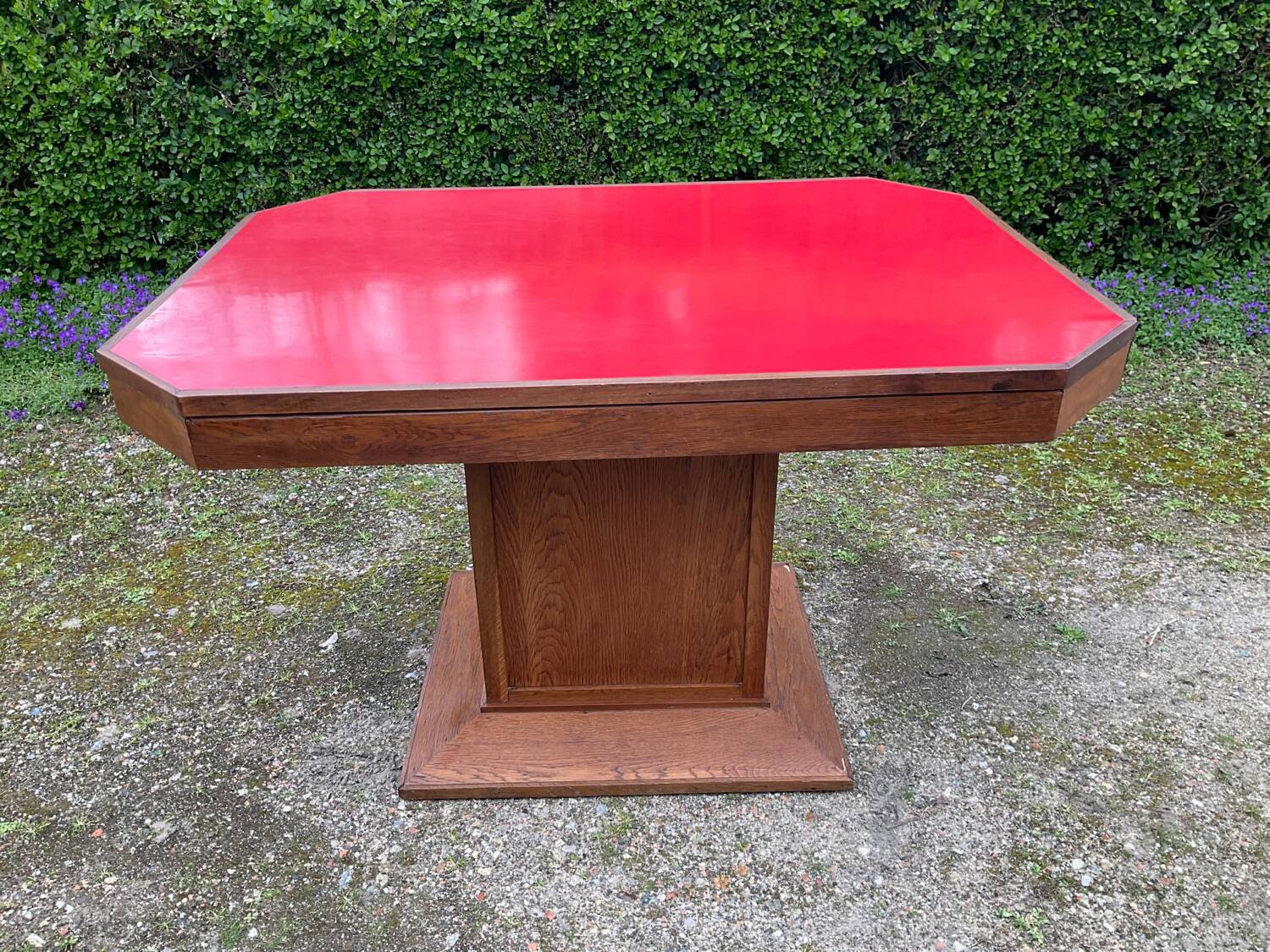 Art Deco dining table in wood and red Formica