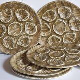 Six oyster plates earthenware with matte enamel, 50s