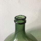 Demijohn old bottle in blown glass