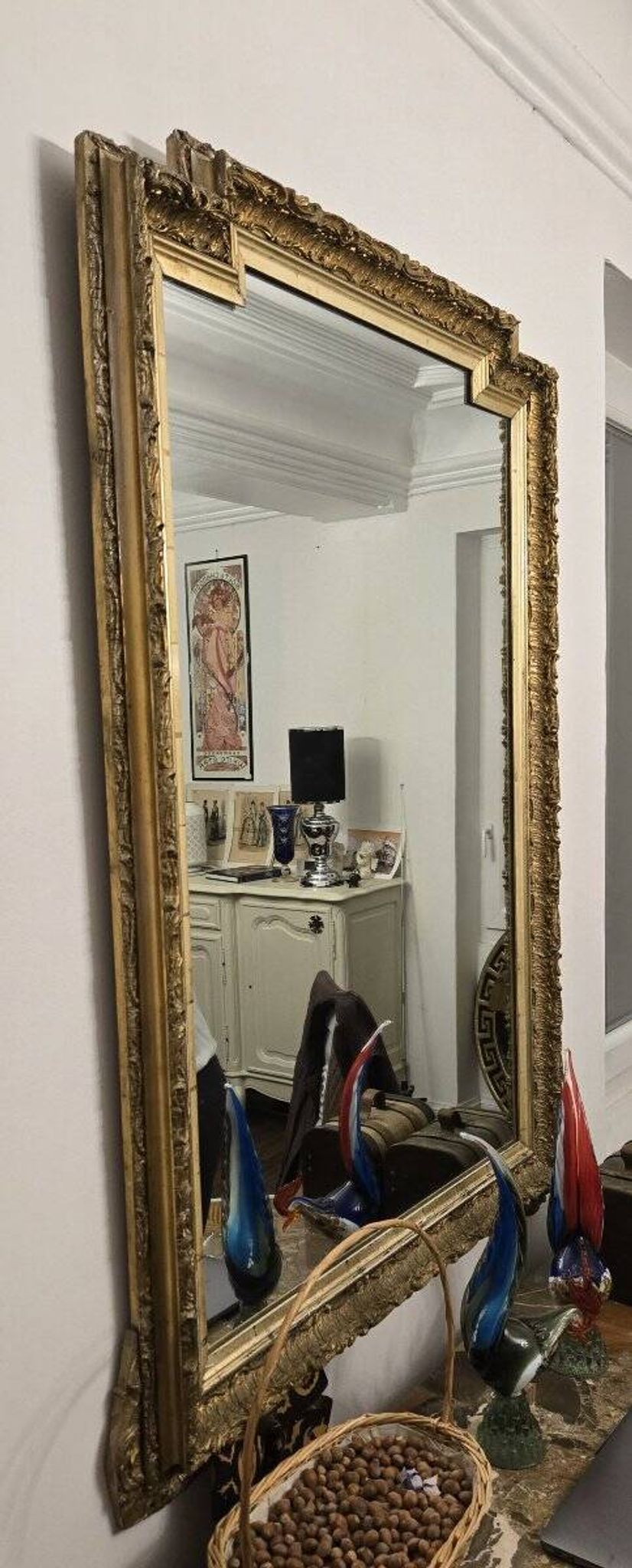 Large antique mirror from the Napoléon III era, finely carved and gilded with gold leaf.