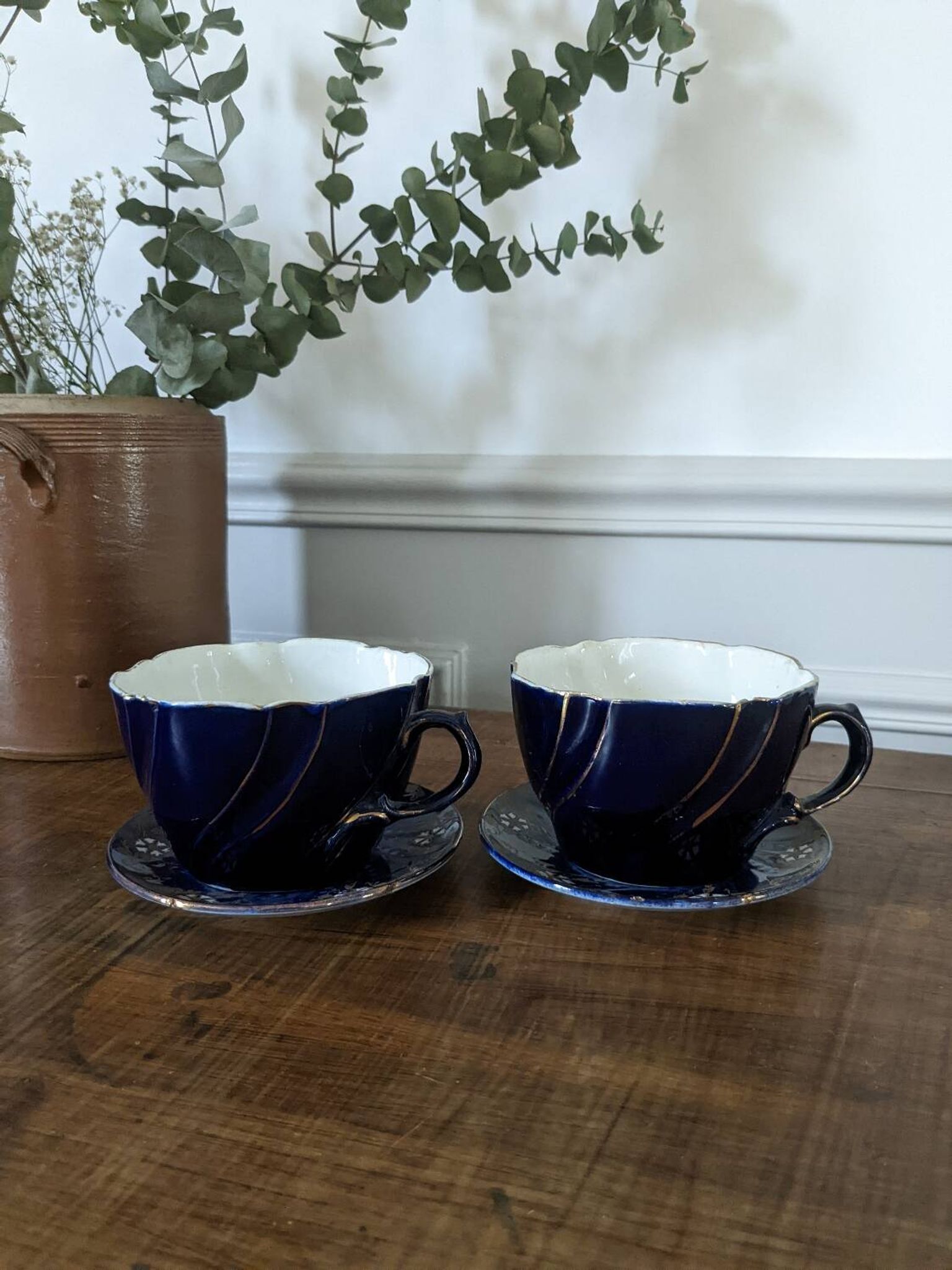 Set of two large Lunéville cups and saucers