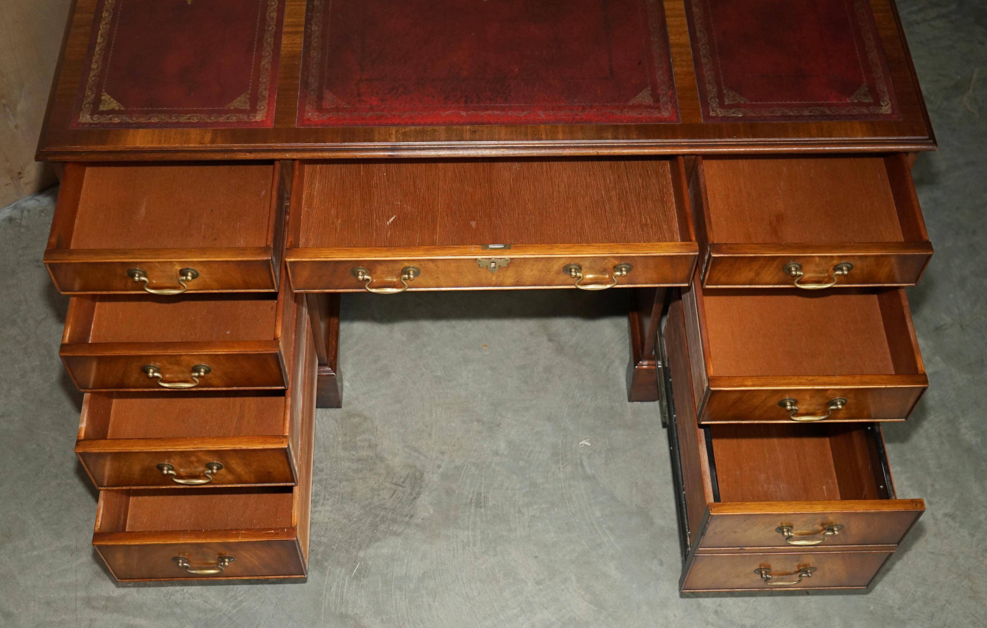 Partner desk Bevan Funnell in hardwood with leather top and gold leaf gilding.