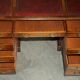 Partner desk Bevan Funnell in hardwood with leather top and gold leaf gilding.