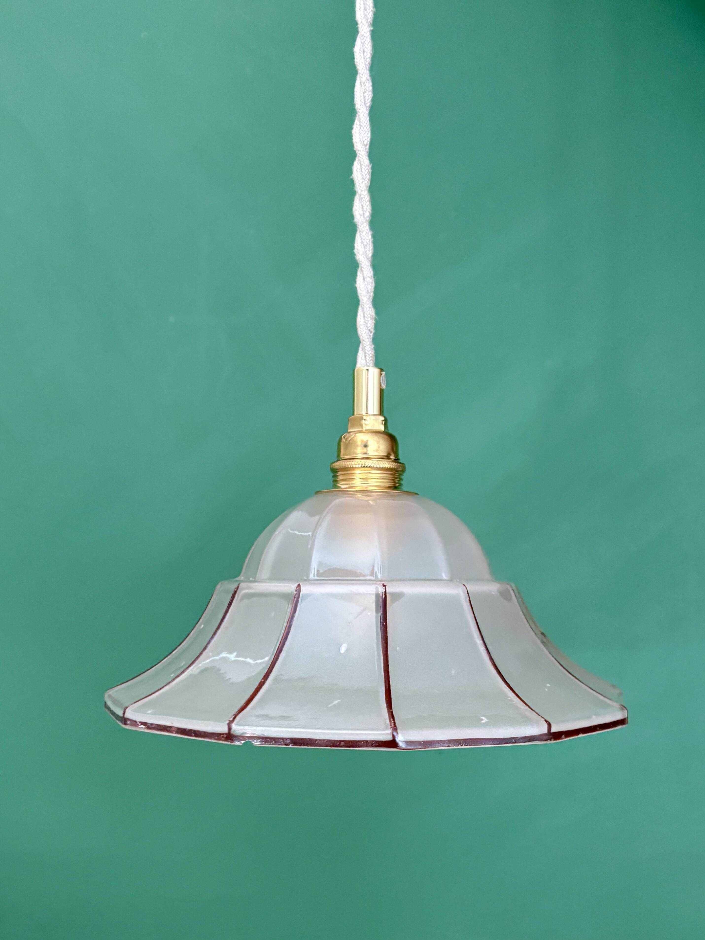 Pendant light with red striped frosted glass shade
