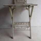 Small antique folding wooden dressing table with tiles and a mercury mirror.