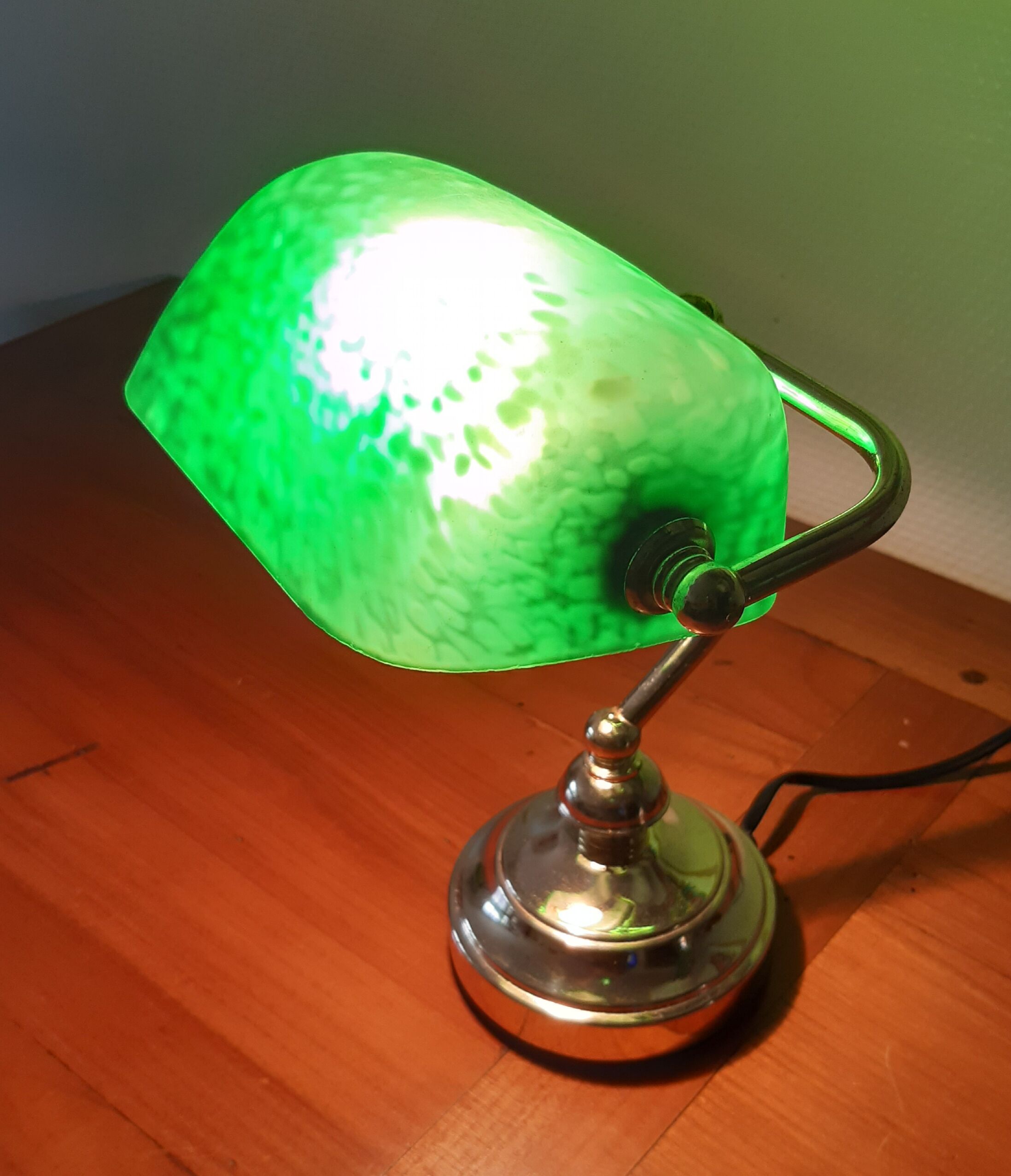 Glass and old brass banker lamp