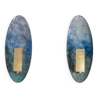 Pair of patinated brass wall lights. Contemporary work.