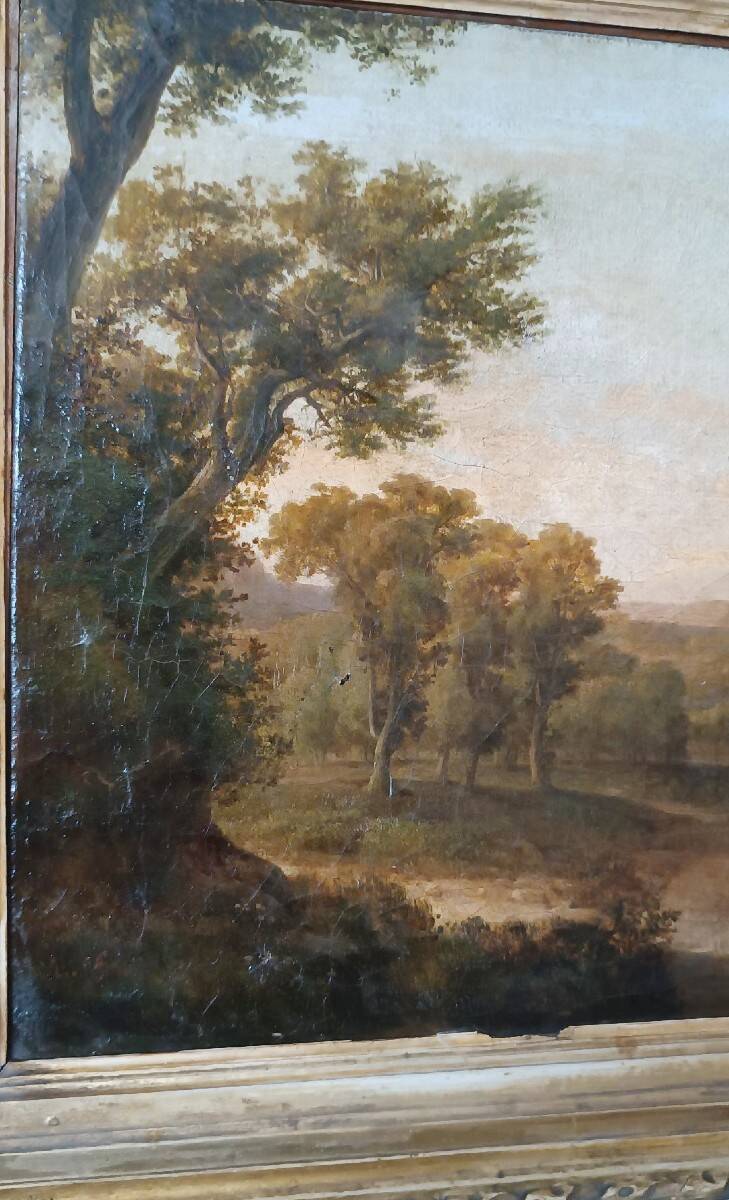 Antique painting on canvas depicting a bucolic landscape