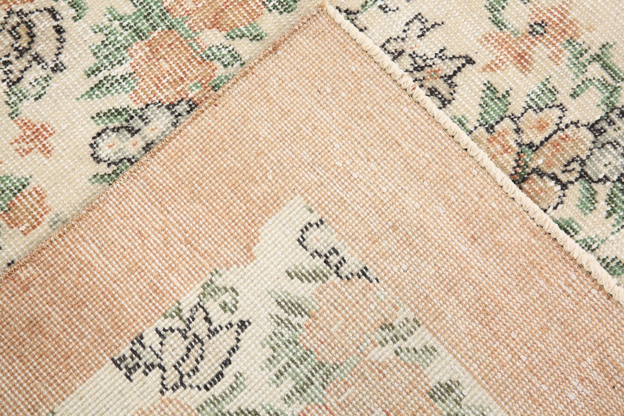 Tapis en laine et coton à décor floral