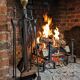Antique fireplace set in solid wrought iron and brass.