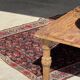 Iranian rug with stylised floral patterns in pink and blue, 155x105.
