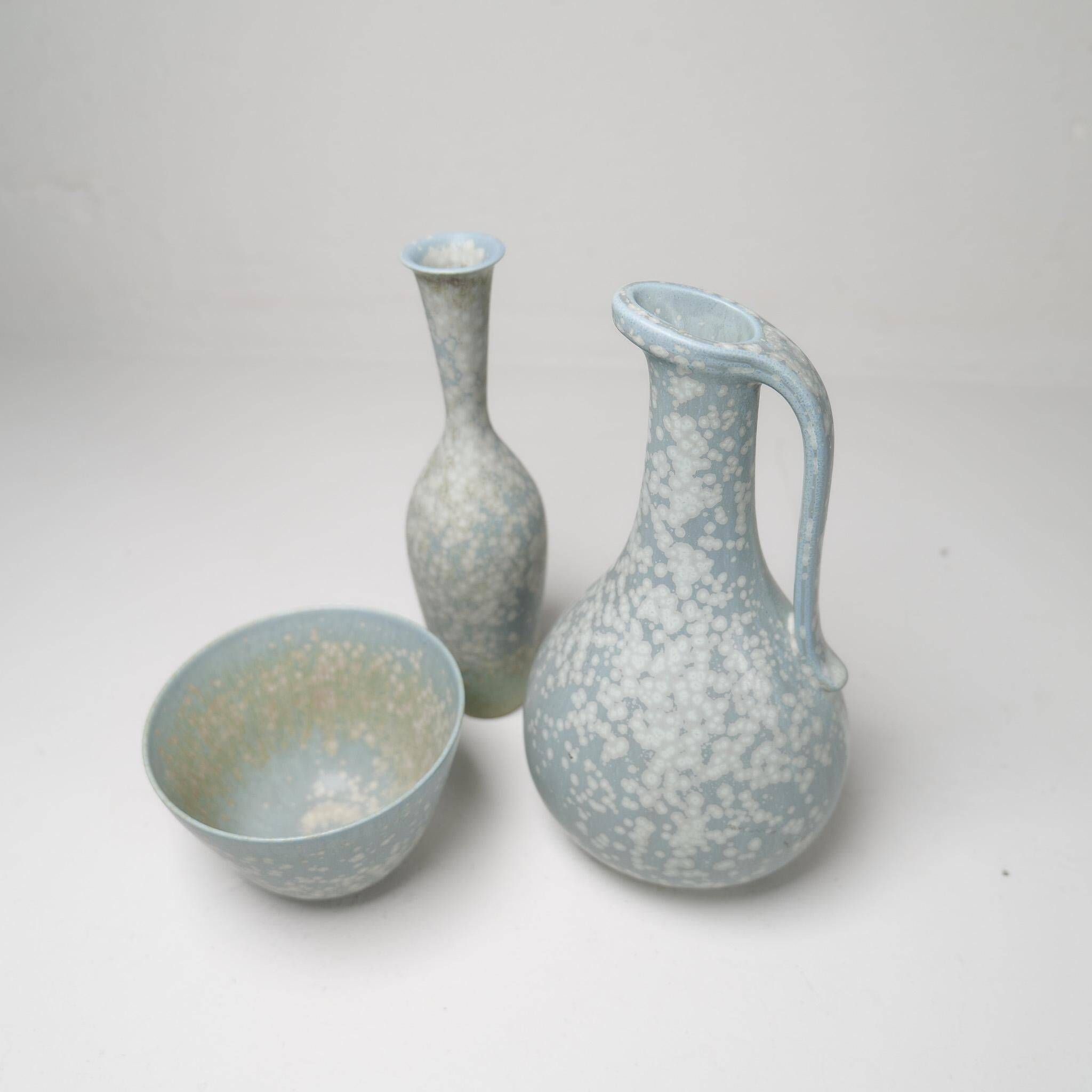 Mid-century modern three-piece ceramic set by Rörstrand, Gunnar Nylund, Sweden, 1950s.