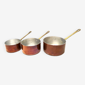Series of 3 old copper saucepans with vintage decorative brass handles