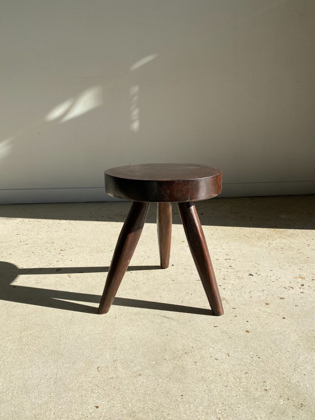 brown solid wood stool flat circular seat