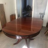 Round mahogany dining table