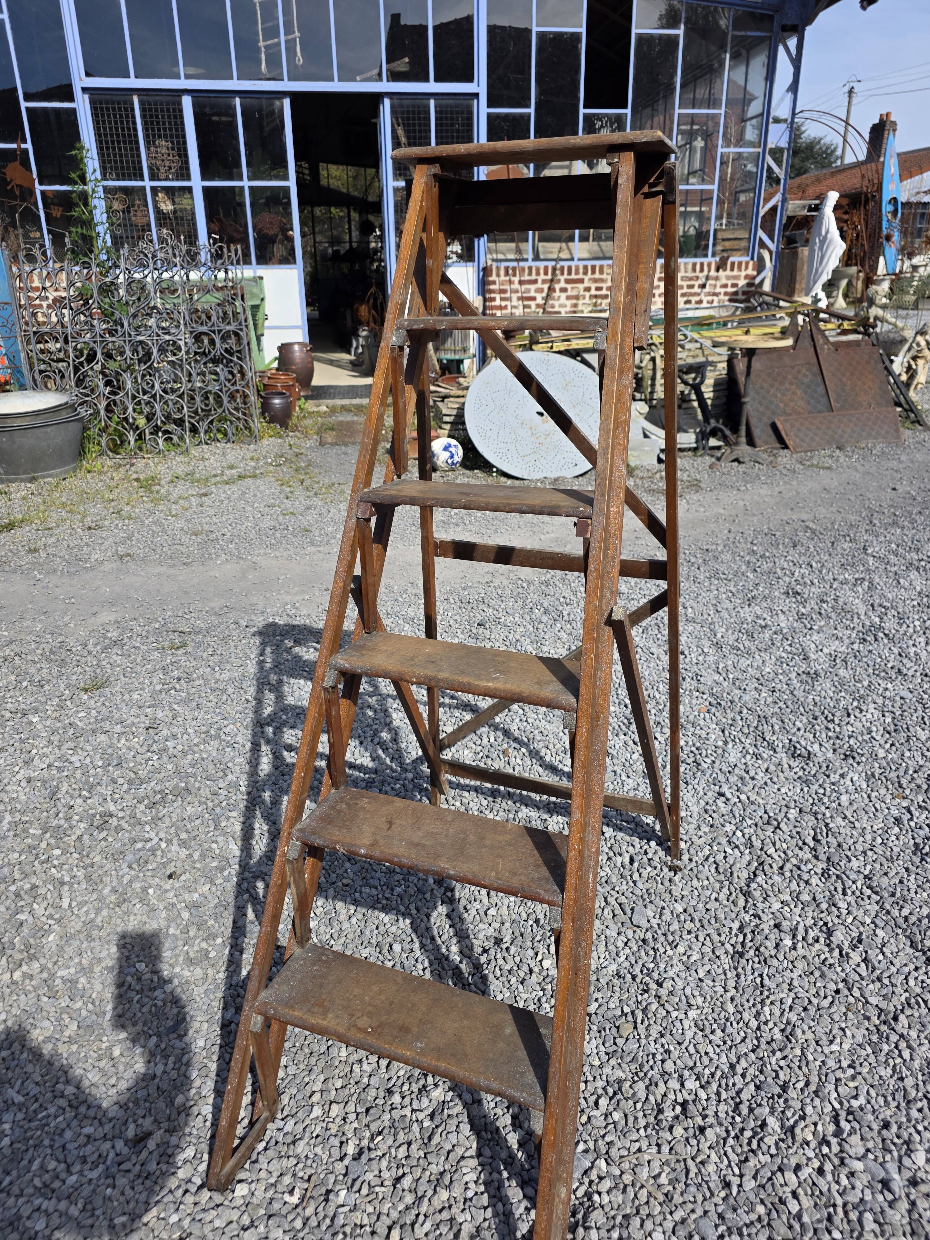 Old wooden step ladder with 6 steps