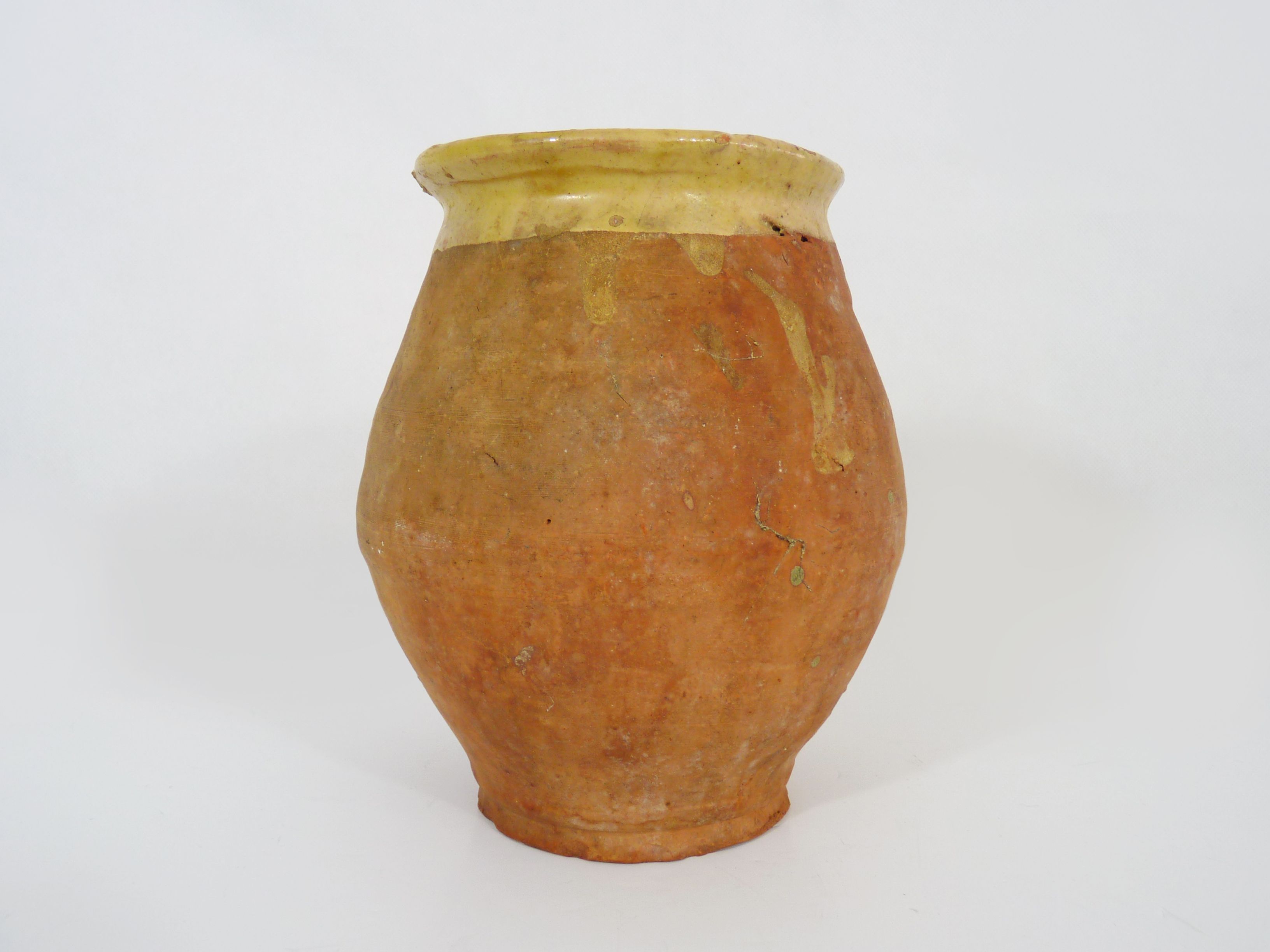 Beautiful little grease pot in yellow terracotta and glazed green. NINETEENTH century