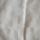 Antique linen tablecloth embroidered with flowers