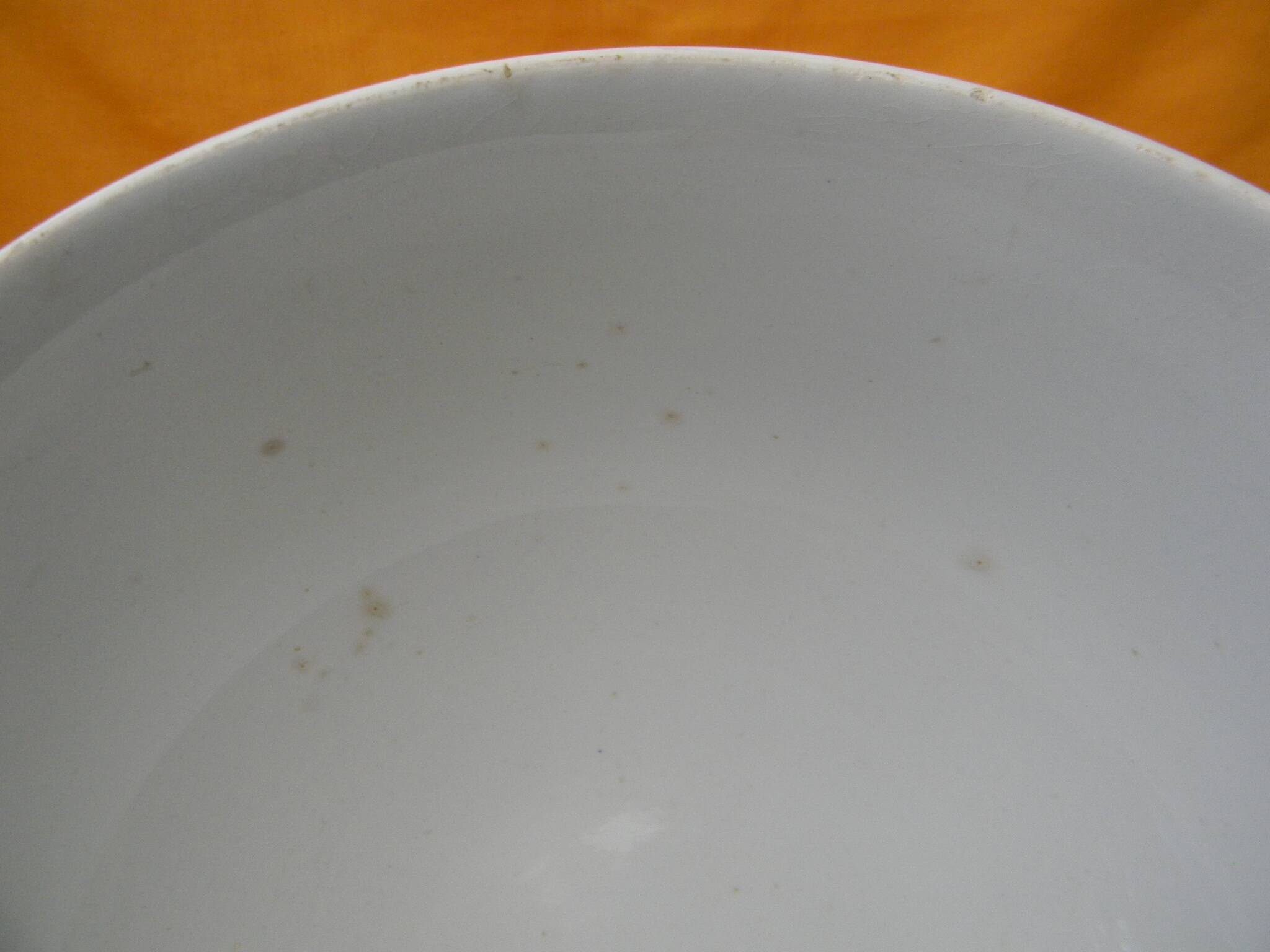 Vintage earthenware salad bowl. Flower decor.