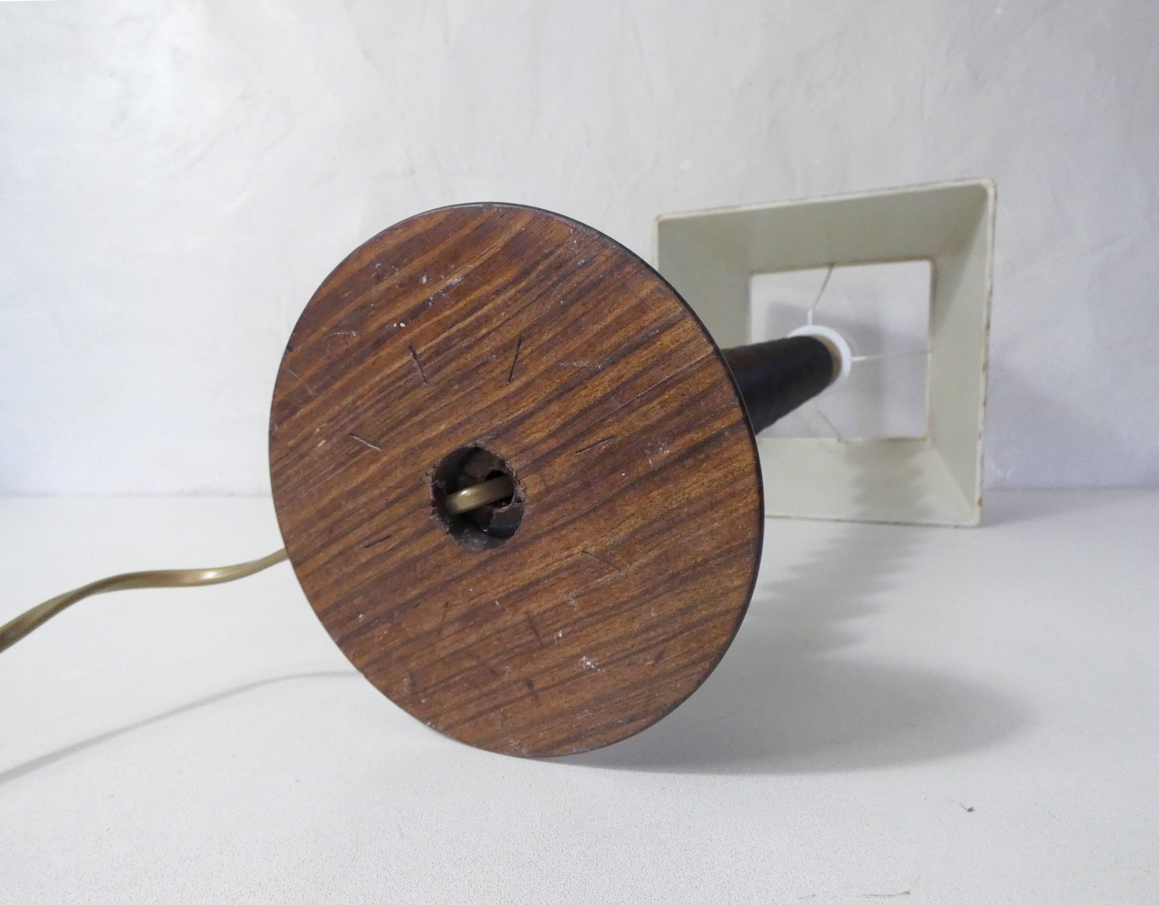 turned wooden lamp with spool base and vintage copper shade