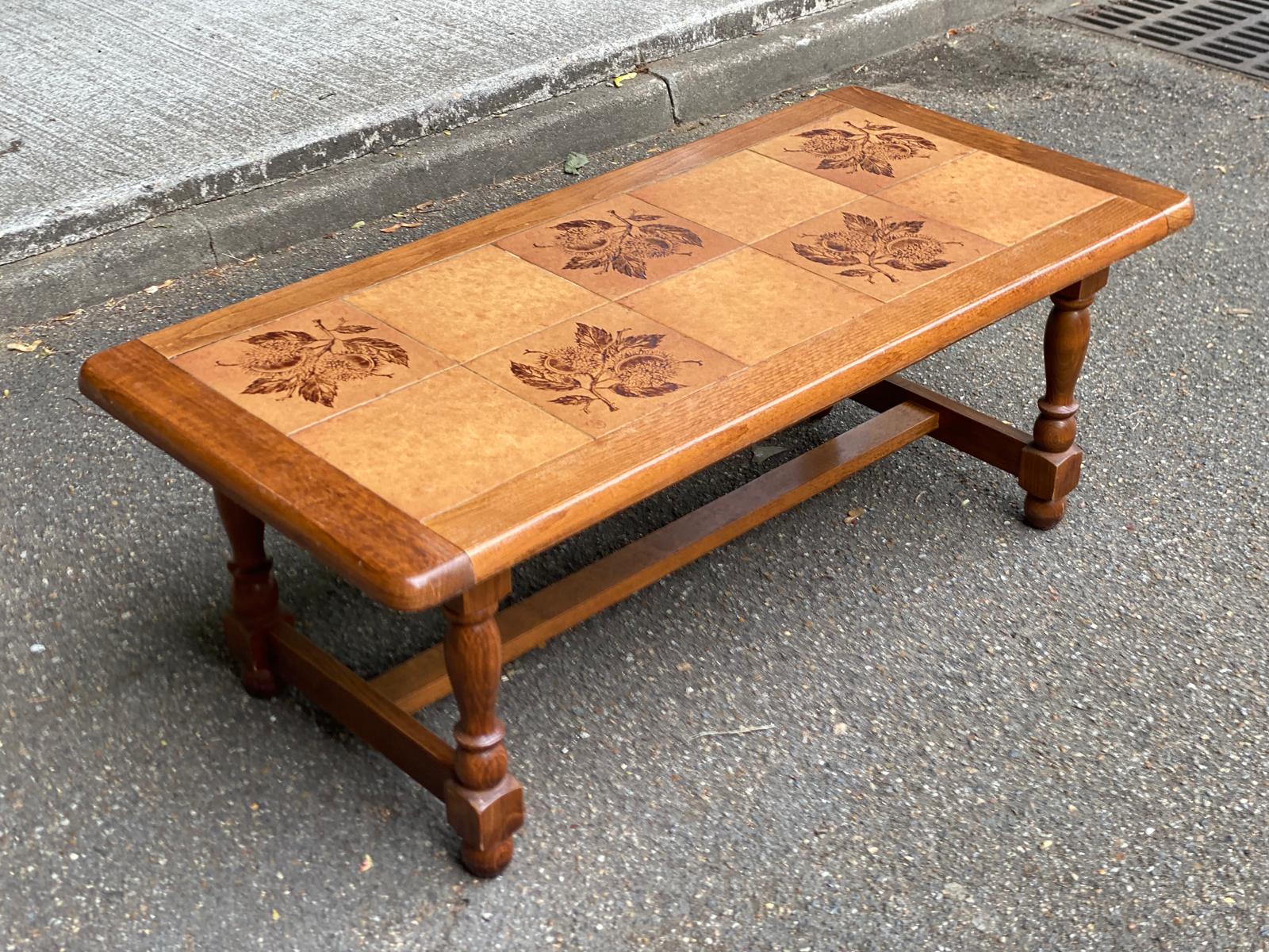 Solid wood and ceramic coffee table from the 1970s.