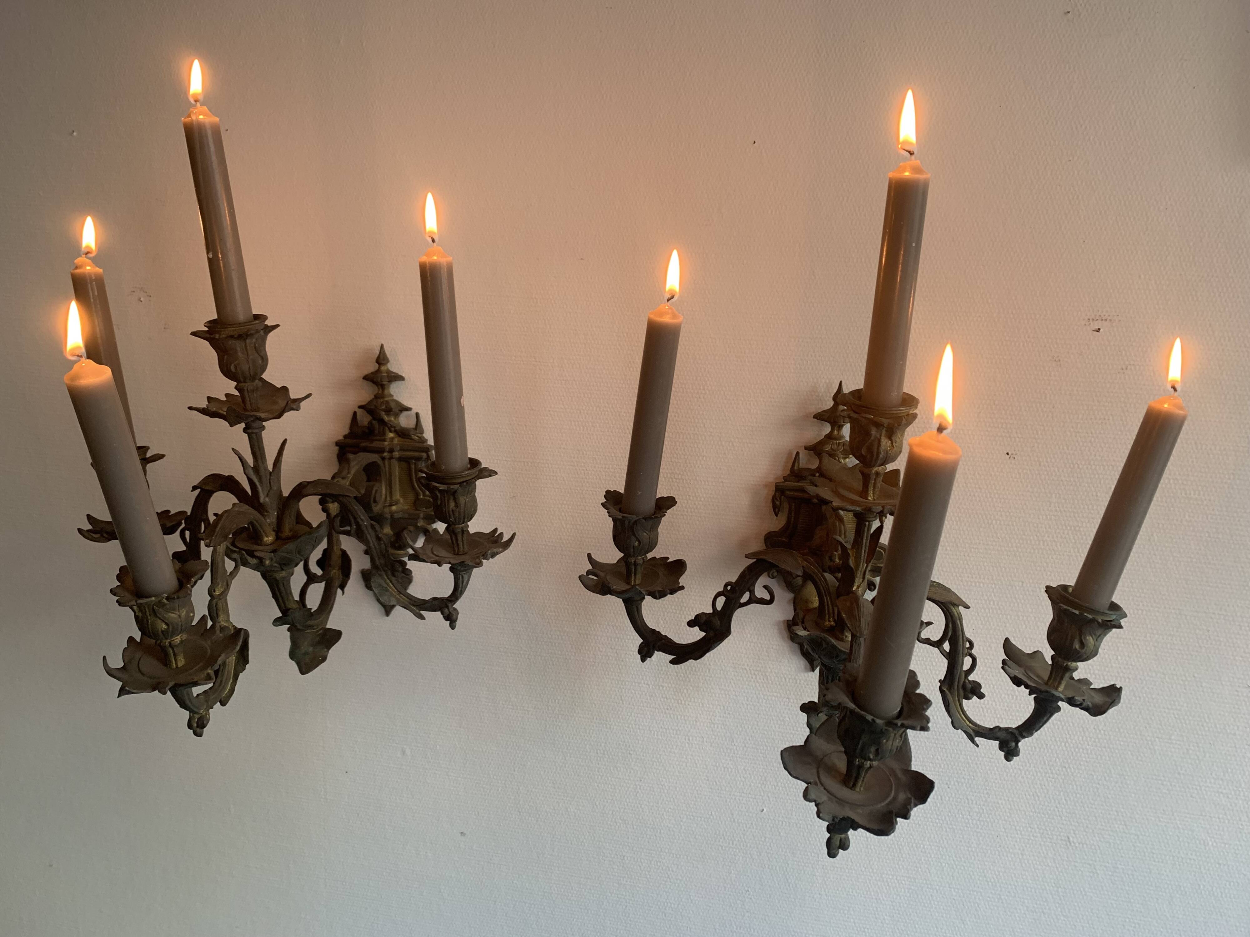 Antique patinated bronze wall sconce – 4 light arms, 19th century
