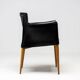 Set of four Vela leather armchairs by Carlo Bartoli - Italian modern elegance.