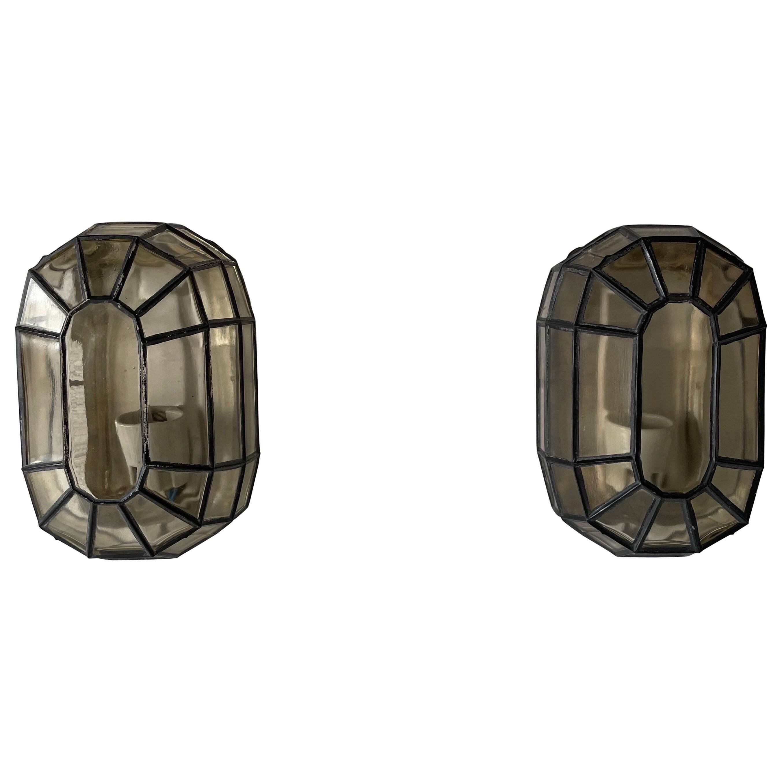Pair of black iron wall sconces with structured glass by Limburg, 1960s, Germany.