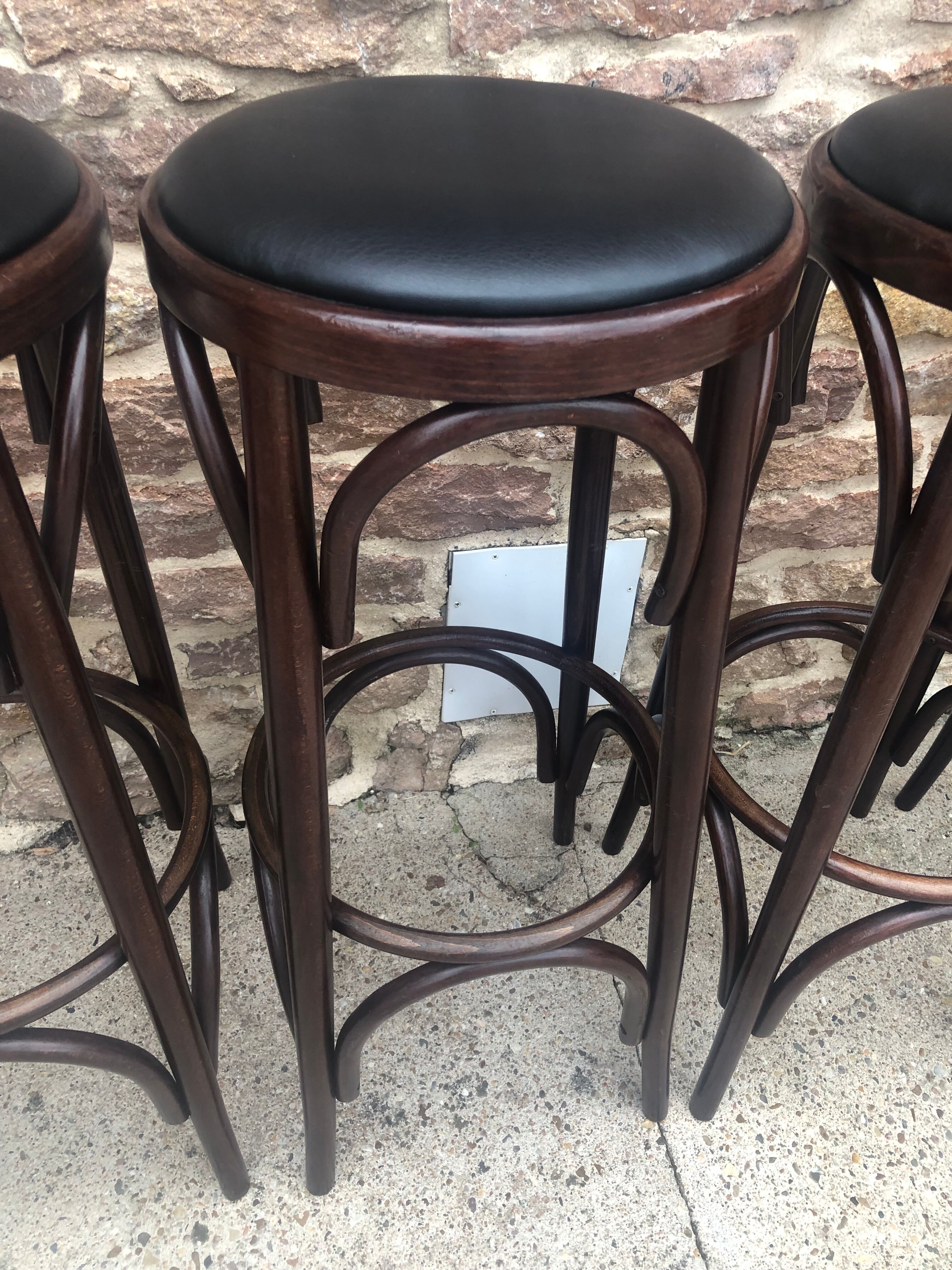 Suite of 4 bar stools