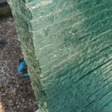 Solid glass desk with a half-moon top.