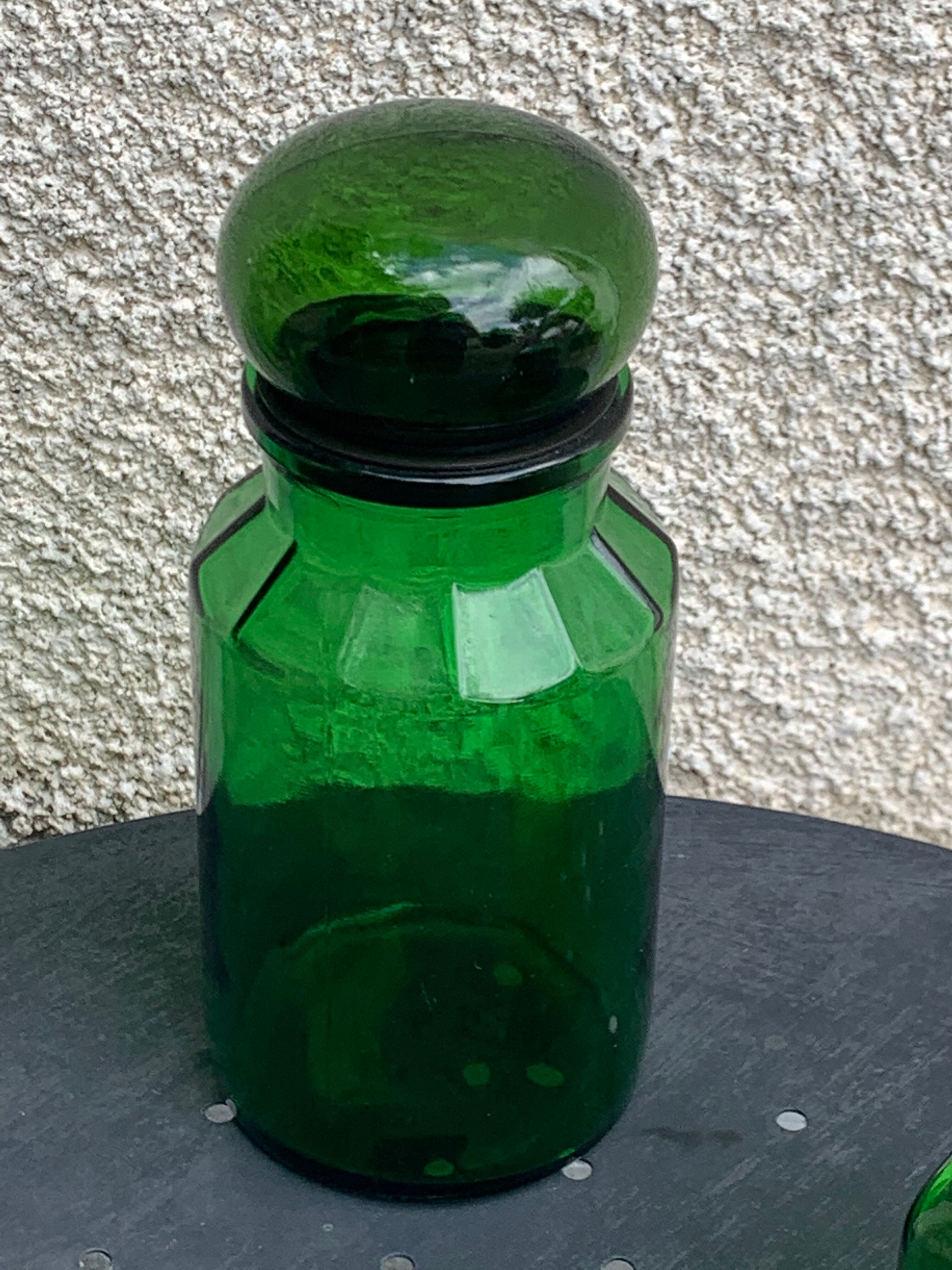 Two jars in green glass advertising vintage 1970