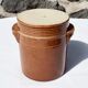 Trio of stoneware pots with lids