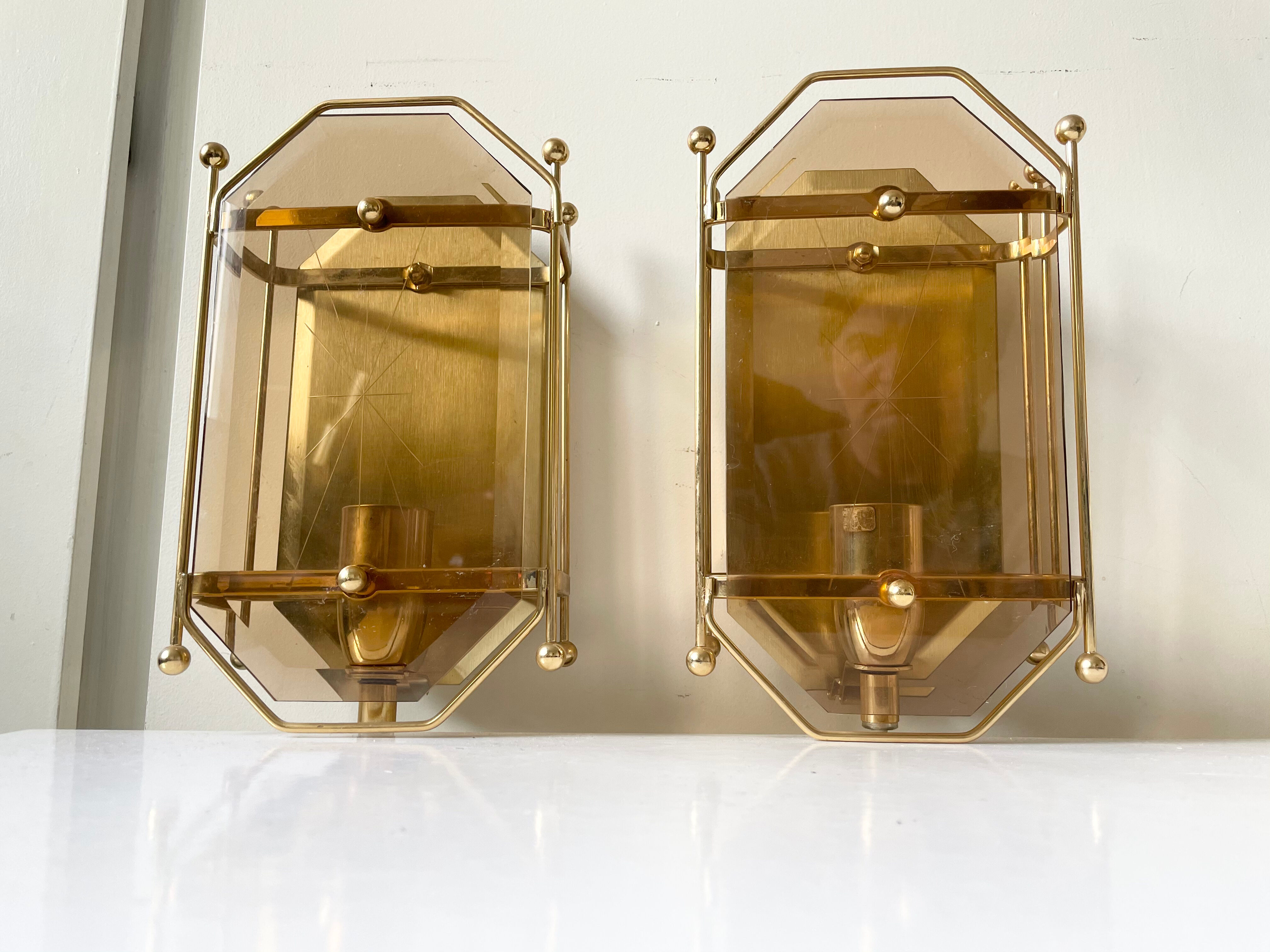 Pair of Scandinavian Vintage  wall light Sconce in Brass & Amber colored Glass