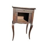 Curtained bedside table