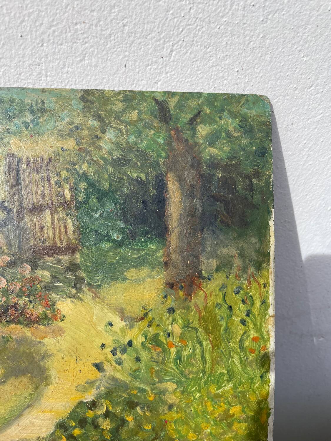 Paysage jardin à l’huile signé