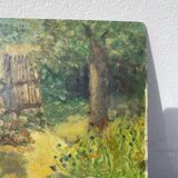 Garden landscape in oil signed