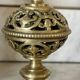 pair of openwork gilded brass candlesticks from the 19th century
