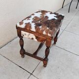 Vintage cowhide trunk stool