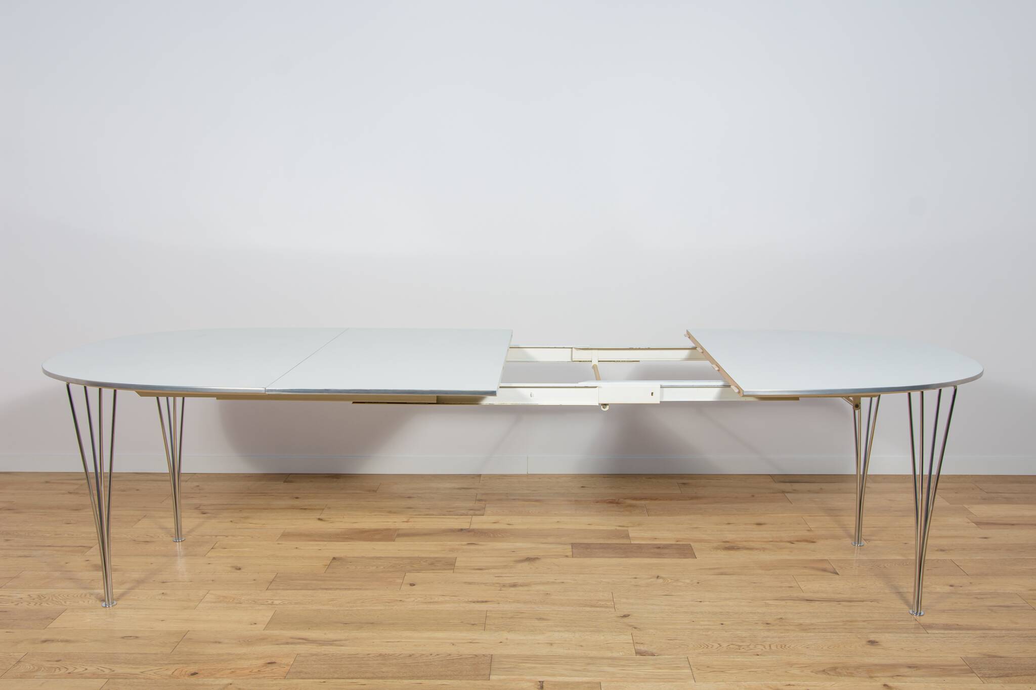Mid Century Modern Extendable Ellipse B612 Dining Table by Piet Hein & Brun
