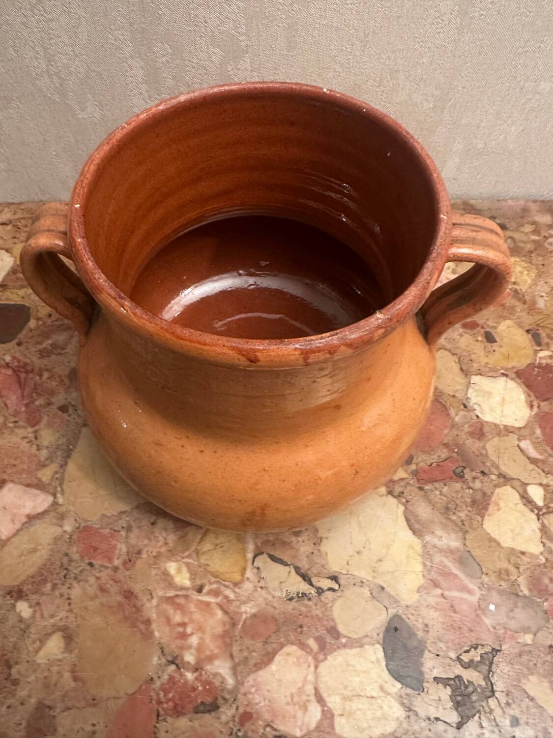 Old pot with handles in glazed Provençal pottery
