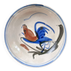 Antique dish with bird decoration