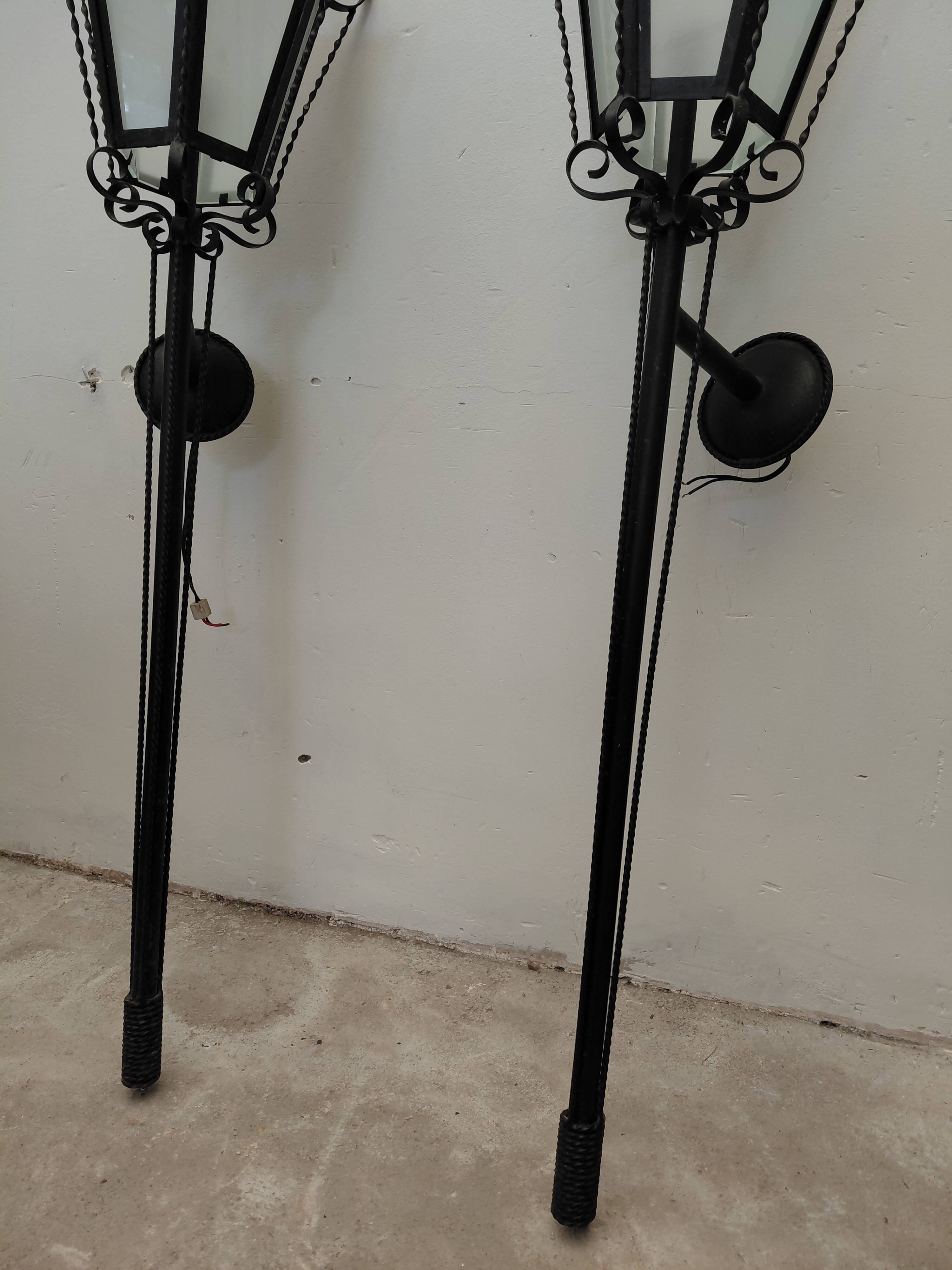 Pair of wrought iron wall sconces, 1950