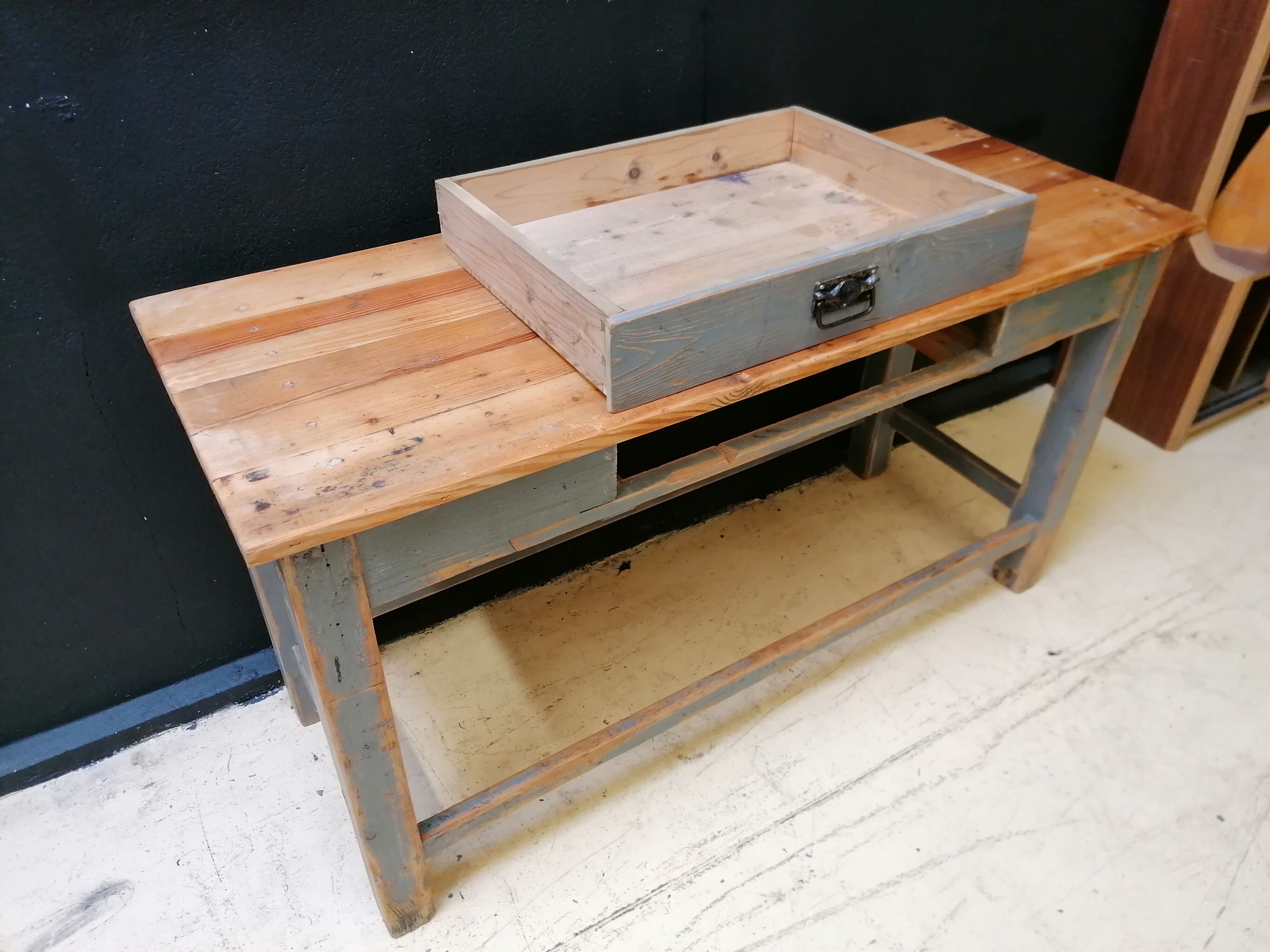 Patinated drapery table