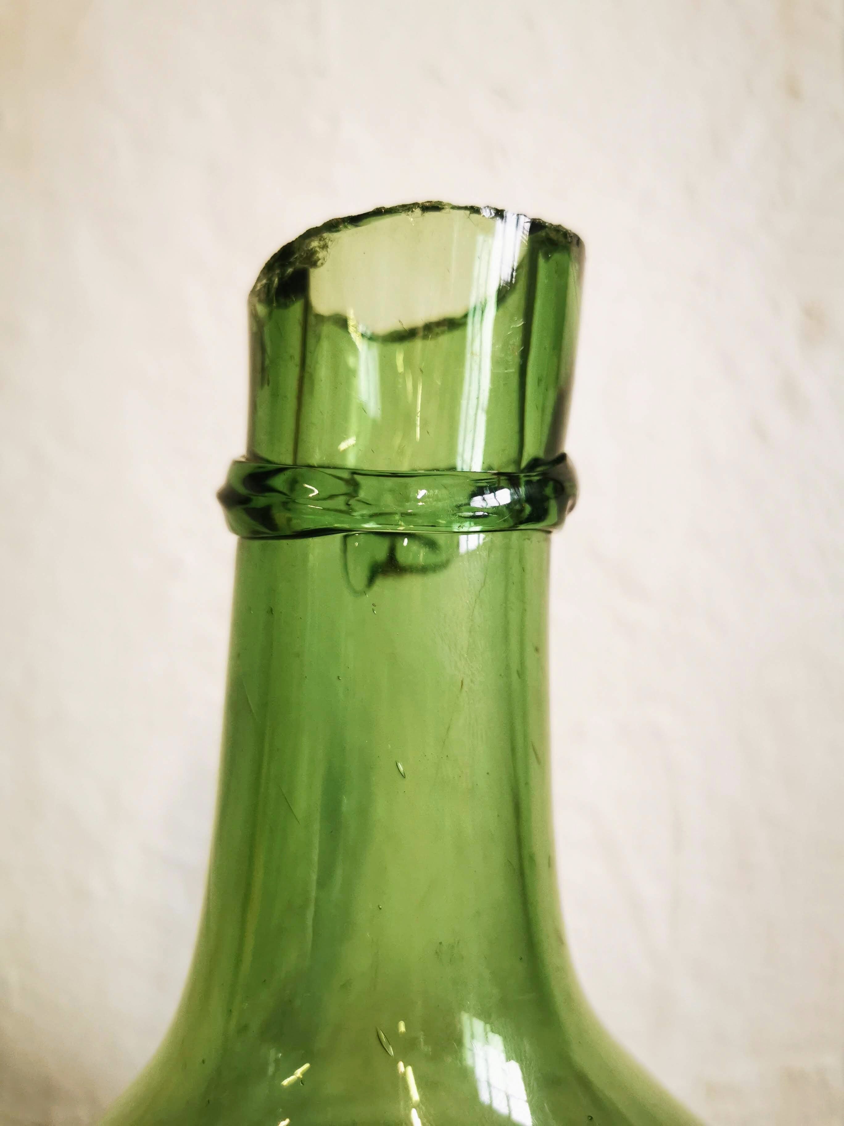 Green demijohn contains 12 liters